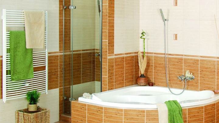 Bathtub And White Towel Rack And White And Wooden Background
